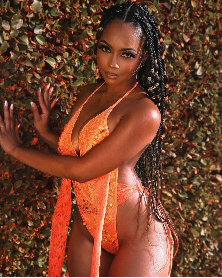 FacetFine model wearing a designer collection piece