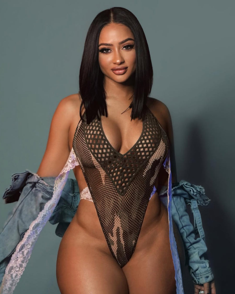 FacetFine model wearing a designer collection piece